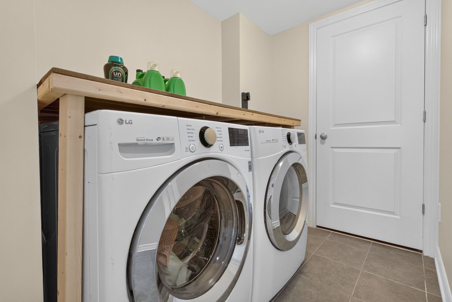 Laundry room with full-size washer and dryer